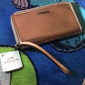 NWT Metallic Mirror Rose Gold Coach Wrist Clutch